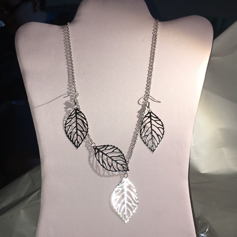 Silver necklace and matching earrings